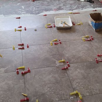 Sean’s Flooring & Painting Services - Tile in one of the bedrooms - Flooring Near Me
