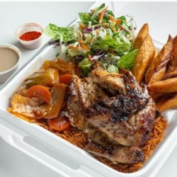 Lazare's BBQ House - 1/4 chicken with rice topped with vegetable, fried plantains and a salad