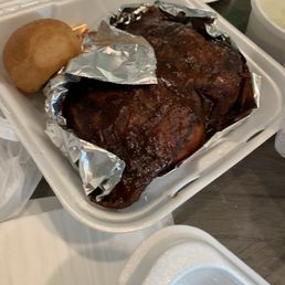Barbecued rib and chicken combo. Barbecued rib and chicken combo.