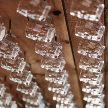 Restaurant at Smuttynose - wine glasses hanging from the ceiling - New American Near Me - Hampton, New Hampshire Restaurant at Smuttynose - wine glasses hanging from the ceiling - New American Near Me - Hampton, New Hampshire