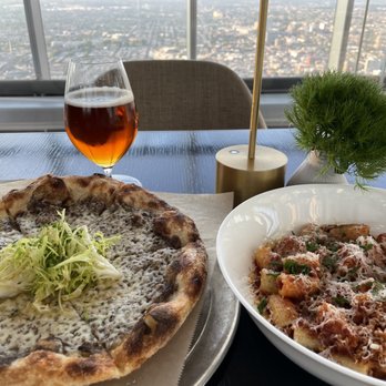 Skyhigh - Left: Black truffle and fontina Cheese Pizza  Right: rigatoni with Meatballs - Bars Near Me - Philadelphia, Pennsylvania