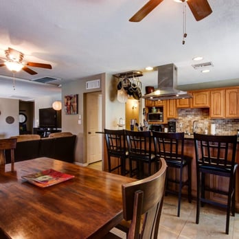 John Cunningham eXp Realty - SOLD: 8251 E. Monterosa St Scottsdale Arizona with view of kitchen from dining area - Real Estate Agents Near Me - Phoenix, Arizona