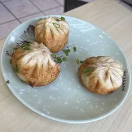 3/5 pan fried pork bun, because we couldn't wait for a photo before digging in 3/5 pan fried pork bun, because we couldn't wait for a photo before digging in