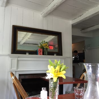 Farm Country Kitchen - Wood beam ceilings and fresh flowers for a real country feel - American Near Me - Riverhead, New York