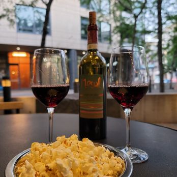 Frank Wine Bar - two glasses of wine and a plate of macaroni and cheese - Wine Bars Near Me - Portland, Oregon