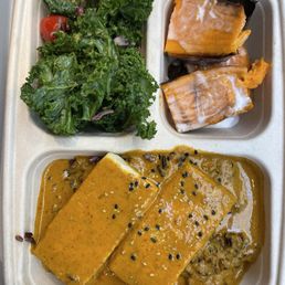 Signature curry with kale salad and sweet potato Signature curry with kale salad and sweet potato
