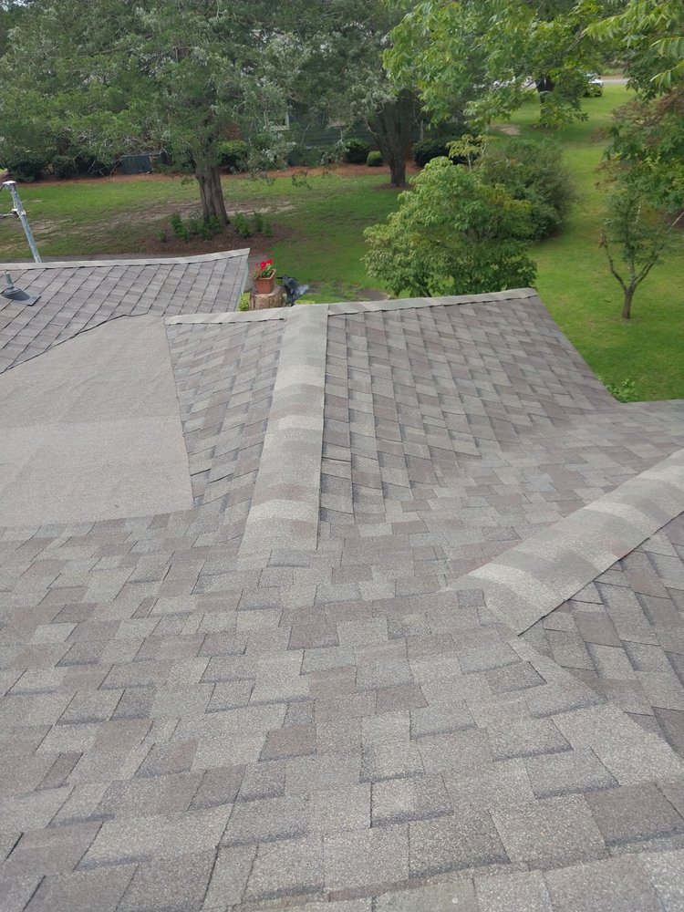 Slide of Tyndal Roofing