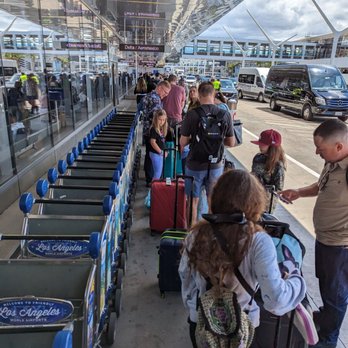 Delta Air Lines - Line for Delta self-tagged baggage today at 12:04 PM. It took us 29 minutes from here, the back of the line that started outside. - Airlines Near Me - Los Angeles, California