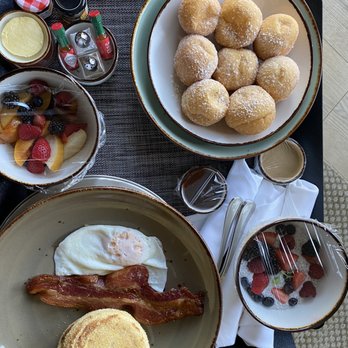 Solbar - In room breakfast with donut holes, chia pudding, happy kid and fruit - New American Near Me - Calistoga, California Solbar - In room breakfast with donut holes, chia pudding, happy kid and fruit - New American Near Me - Calistoga, California