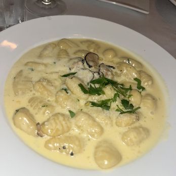 Snaps American Bistro - Butter Poached Potato Gnocchi/truffle Parmesan Sauce - New American Near Me - Wantagh, New York Snaps American Bistro - Butter Poached Potato Gnocchi/truffle Parmesan Sauce - New American Near Me - Wantagh, New York