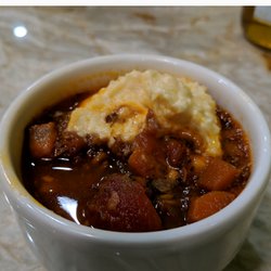 Elroy's Deli Market - Osso Bucco with polenta. Very delicious, polenta on point creamy.