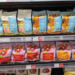 Bags of Joe Van Gogh coffee beans available at Whole Foods Market in Chapel Hill, NC.