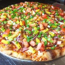 Delish Pizza - Zi Maui Pizza "Spicy Red Sauce, Mozzarella Cheese, Canadian Bacon, Smoked Crumbled Bacon, Red Onion, Pineapple, Tomatoes and Green Onions"