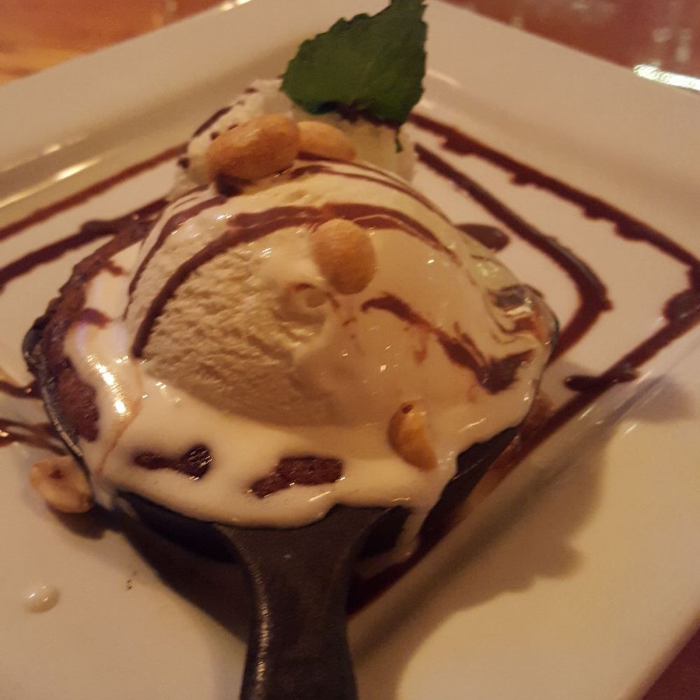 The Blue Rock - There is a cookie dough underneath the ice cream cooked on the miniature skillet. - New American Near Me - Shelburne Falls, Massachusetts The Blue Rock - There is a cookie dough underneath the ice cream cooked on the miniature skillet. - New American Near Me - Shelburne Falls, Massachusetts