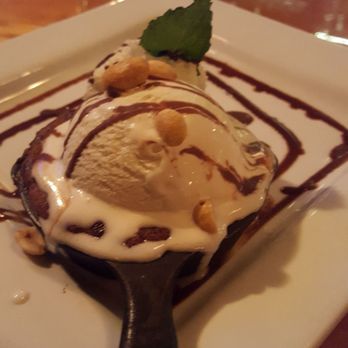 The Blue Rock - There is a cookie dough underneath the ice cream cooked on the miniature skillet. - New American Near Me - Shelburne Falls, Massachusetts The Blue Rock - There is a cookie dough underneath the ice cream cooked on the miniature skillet. - New American Near Me - Shelburne Falls, Massachusetts