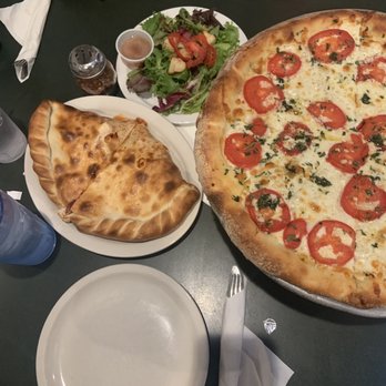 Strombolli's Pizzeria - Pizza and chicken calzone - Pizza Near Me - Page, Arizona Strombolli's Pizzeria - Pizza and chicken calzone - Pizza Near Me - Page, Arizona