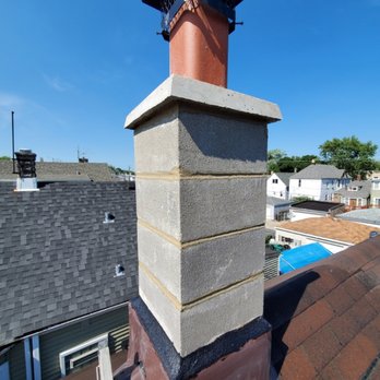 John's Home Remodeling & Construction - New chimney installed with new pipe and capping. - General Contractors Near Me - Chicago, Illinois