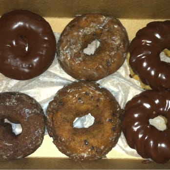Home Cut Donuts - Clockwise from top left. Double chocolate, two blueberry, two chocolate covered crullers, and a Swiss chocolate donut. - Donuts Near Me - Joliet, Illinois Home Cut Donuts - Clockwise from top left. Double chocolate, two blueberry, two chocolate covered crullers, and a Swiss chocolate donut. - Donuts Near Me - Joliet, Illinois