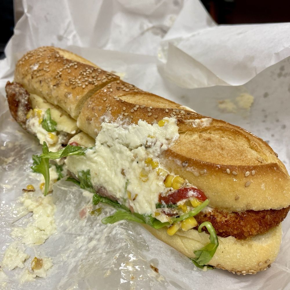 mercato cucina - Aug 2024 Special - The Fratelli  crispy chicken, prosciutto, burrata, summer corn bruschetta, bomba chili - Coffee & Tea Near Me - Huntington Station, New York