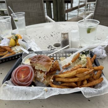 Tiki Bar & Grill - Fried mahi sandwich with fries, very good! - Tiki Bars Near Me - Sebastian, Florida