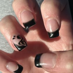 The pinky finger had a completely different French tip style
