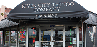 River City Tattoo & Piercing Co by null
