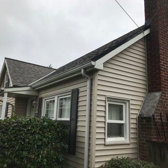Raindrop Roofing NW - Taking care around the edges and fireplace. - Roofing Near Me - Beaverton, Oregon Raindrop Roofing NW - Taking care around the edges and fireplace. - Roofing Near Me - Beaverton, Oregon