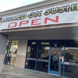 Hooked On Sushi - Here's the front. Behind shell. Apple Maps made it hard to find.