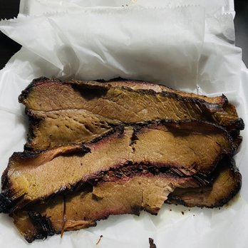 Glenns Bbq and Produce - Brisket (one piece ripped off to try before picture was taken) - Barbeque Near Me - Columbus, Mississippi