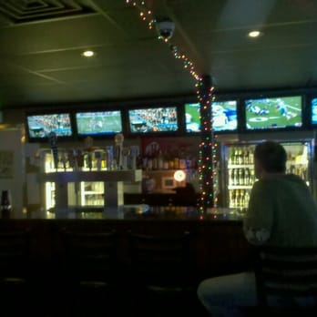 The Point After - a man sitting at a bar - Sports Bars Near Me - Murray, Utah The Point After - a man sitting at a bar - Sports Bars Near Me - Murray, Utah