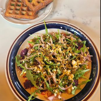 Uncle Wolfie's Breakfast Tavern - Beet salad with a side of sour cream and chive latke waffle - Breakfast & Brunch Near Me - Milwaukee, Wisconsin Uncle Wolfie's Breakfast Tavern - Beet salad with a side of sour cream and chive latke waffle - Breakfast & Brunch Near Me - Milwaukee, Wisconsin