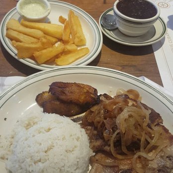 La Carreta - Puerco asado, arroz, frijoles and yucca frita - Latin American Near Me - Miami, Florida