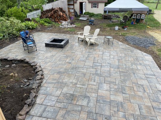 "simple" patio with custom wall/firepit - This is the perfect example of a "Standard" patio with an integrated firepit, On the less expensive side of the project types we offer. Without sacrificing quality or structural integrity. This project was a client special offer but we decided to add this to our list because of how beautiful this 700 sq ft design turned out! This client paid less than $20,000! A one of a kind deal that is now offered to everyone (design varies price), between the patio, firepit, and custom built wall... this is easily a 24,500 project! "simple" patio with custom wall/firepit - This is the perfect example of a "Standard" patio with an integrated firepit, On the less expensive side of the project types we offer. Without sacrificing quality or structural integrity. This project was a client special offer but we decided to add this to our list because of how beautiful this 700 sq ft design turned out! This client paid less than $20,000! A one of a kind deal that is now offered to everyone (design varies price), between the patio, firepit, and custom built wall... this is easily a 24,500 project!