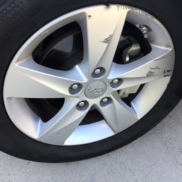Before (note the missing chunk of metal at top of rim.)