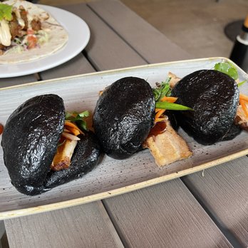 Basalt - Pork Belly Buns - Charcoal bao buns, pickled vegetables, hoisen sriracha sauce - New American Near Me - Honolulu, Hawaii Basalt - Pork Belly Buns - Charcoal bao buns, pickled vegetables, hoisen sriracha sauce - New American Near Me - Honolulu, Hawaii
