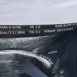 Baby Bump Studios - Bottom right corner says "female".