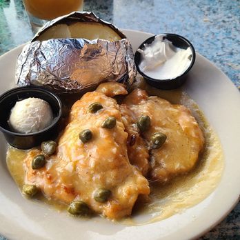 Daddy Jack's Restaurant & Bar - Chicken Piccata was very tender and flavorful, served with baked potato. - American Near Me - Indianapolis, Indiana