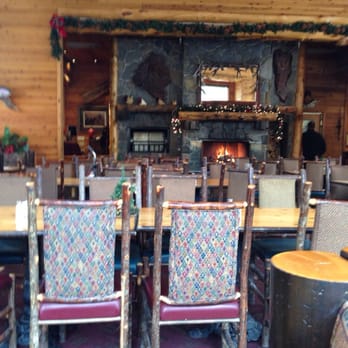 Double Eagle Resort - Dining room in the restaurant with a cracking fire. - Resorts Near Me - June Lake, California
