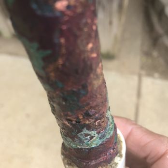 Tankersley Plumbing - a hand holding a pipe - General Contractors Near Me - Olive Branch, Mississippi Tankersley Plumbing - a hand holding a pipe - General Contractors Near Me - Olive Branch, Mississippi