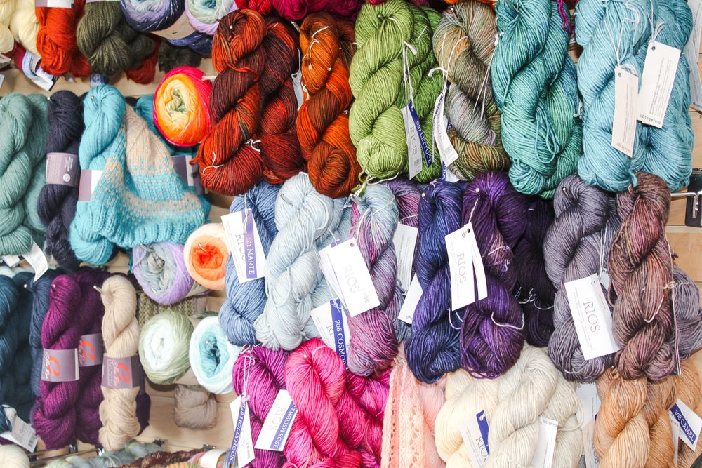 Sunshine Weaving & Fiber Arts Logo