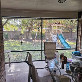 Landmark Custom Exteriors - The screen after installation. - Patio Coverings Near Me