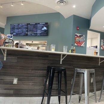 Carangi’s Cafe & Deli - a man sitting at a counter - Breakfast & Brunch Near Me - Northfield, New Jersey Carangi’s Cafe & Deli - a man sitting at a counter - Breakfast & Brunch Near Me - Northfield, New Jersey