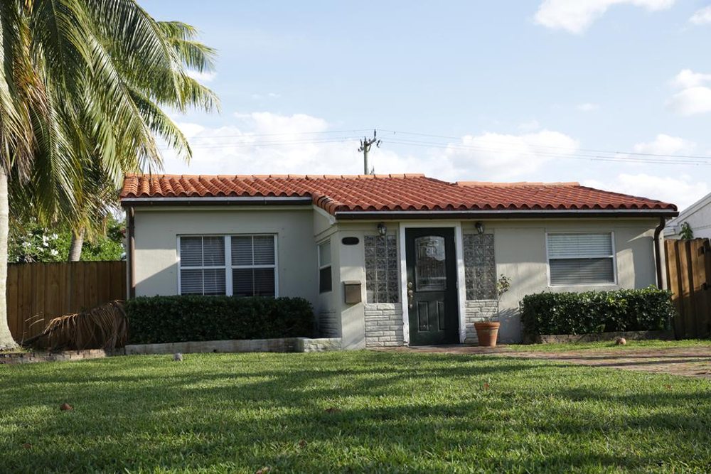 Slide of T & E Roofing