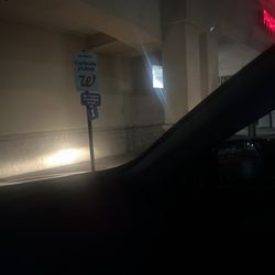 Walgreens - This is with my car lights on. Please make this area safe to get from your car to the front door at night.