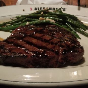 J. Alexander's - Mauhi Ribeye and Green Beans - New American Near Me - Oak Brook, Illinois