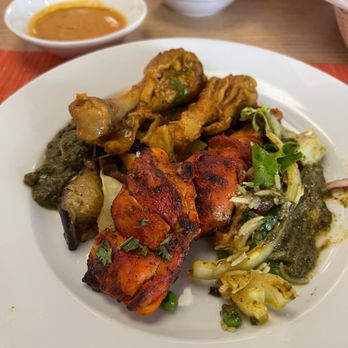 Bhatti Himalayan Grill - Plate 1, veggie rice; tandoori chicken curries, chicken curry, sautéed veggie, spinach paneer & fresh salad...everything was delicious !!! - Indian Near Me - San Diego, California