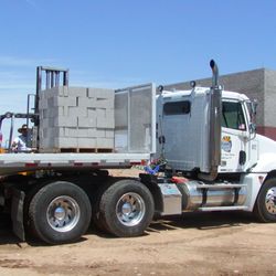 Central Arizona Block Company - All our trucks have forklifts, so can place pallets within reason where required.