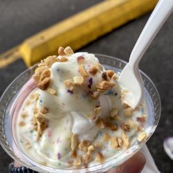 Glenview Dairy Bar - Kid cup of vanilla with birthday cake hard shell and peanuts