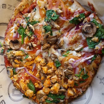 Pieology Pizzeria Southbay Pavillion Mall - Half of it is spicy chicken...the rest is all veggie. Super delish! - Pizza Near Me - Carson, California