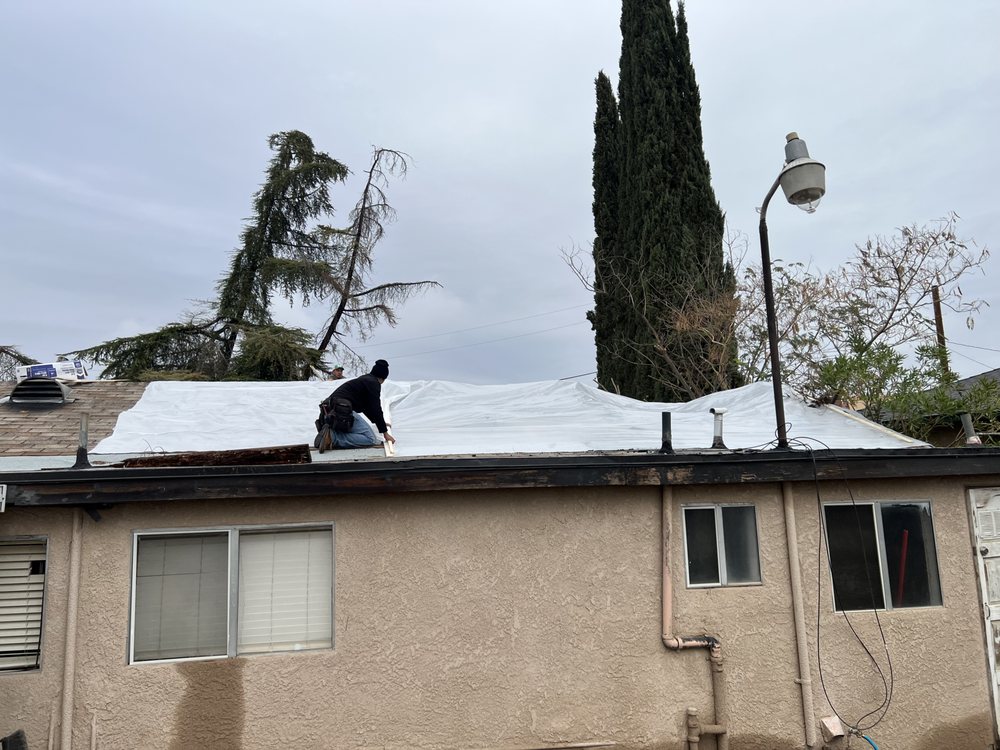 Slide of Roofs 4 Less